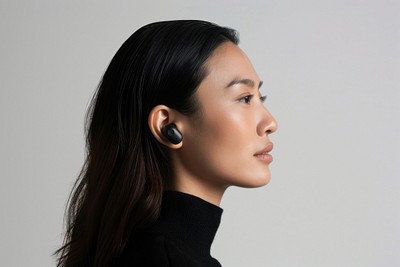 Asian woman with wireless earbuds photography portrait adult.