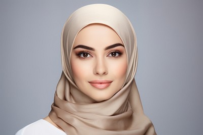 Elegant woman wearing beige hijab