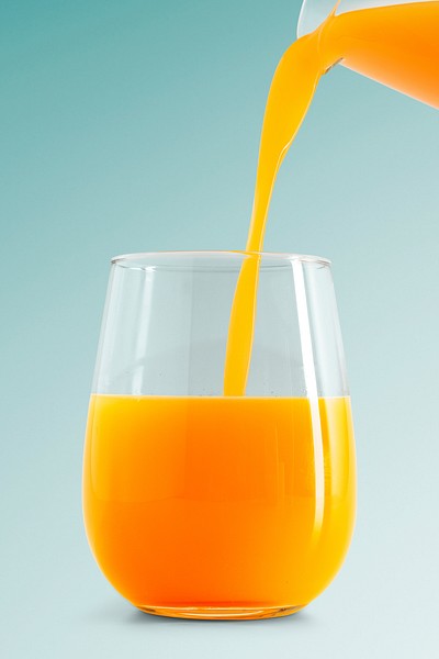 A glass of fresh organic orange juice design element