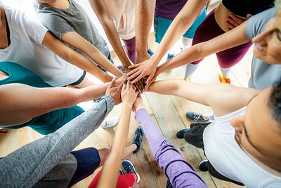 Group diverse people stacking hands | Premium Photo - rawpixel