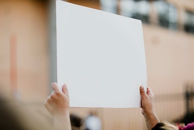 Man holding a blank white | Free Photo - rawpixel