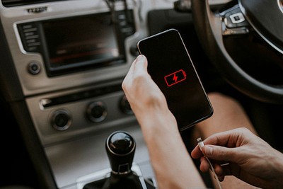 Smartphone charging via cable in a car