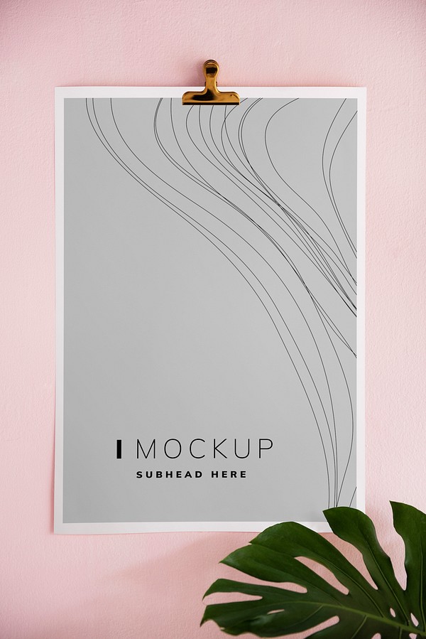 Poster mockup on a pink wall: A vibrant poster design displayed on a soft pink wall, adding a touch of color and creativity to the space.