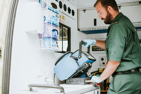 Paramedics work an ambulance | Premium Photo - rawpixel