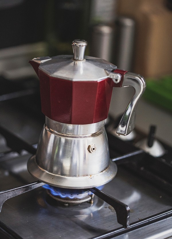 Red teapot on the stove Free Photo rawpixel