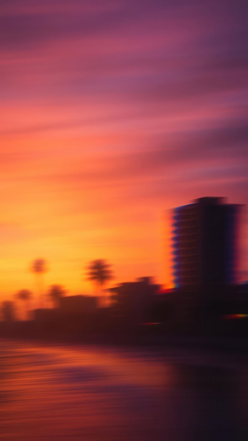 Vibrant sunset cityscape silhouette