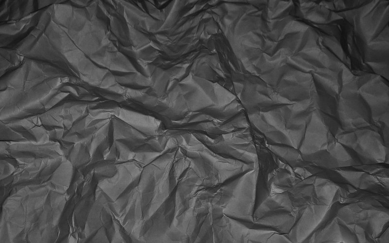 Free Photo  Black crumpled spandex soft fabric surface texture