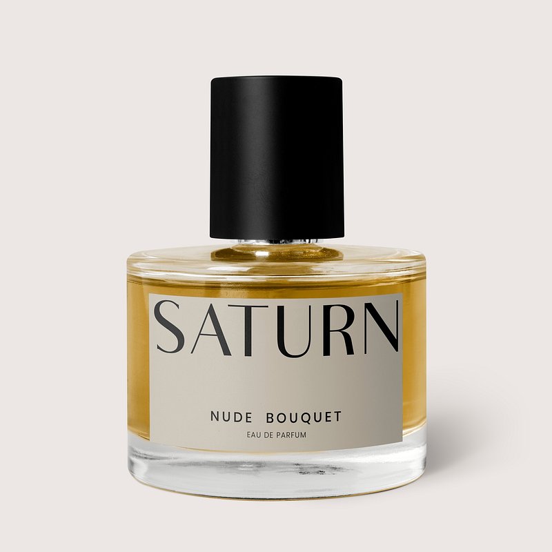 Round glass bottle with yellow fragrance. Perfume mockup