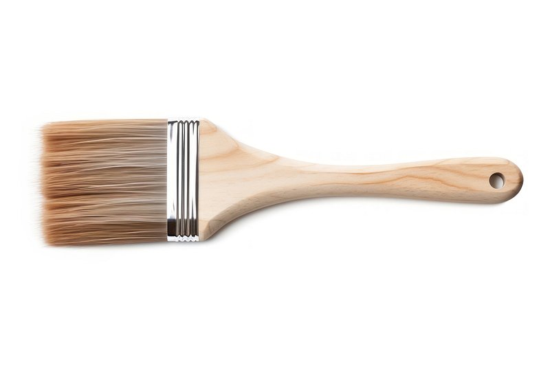 Premium AI Image  A brush with chocolate paint and a wooden handle.