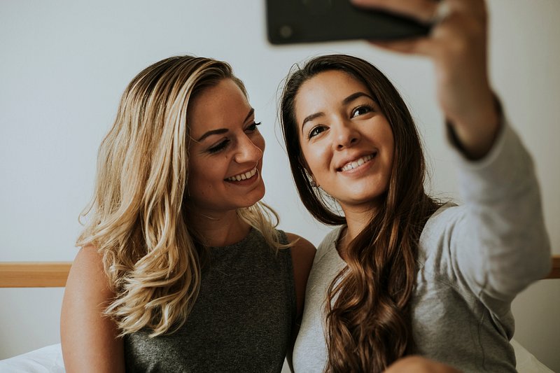 Lesbian couple taking a selfie | Premium Photo - rawpixel
