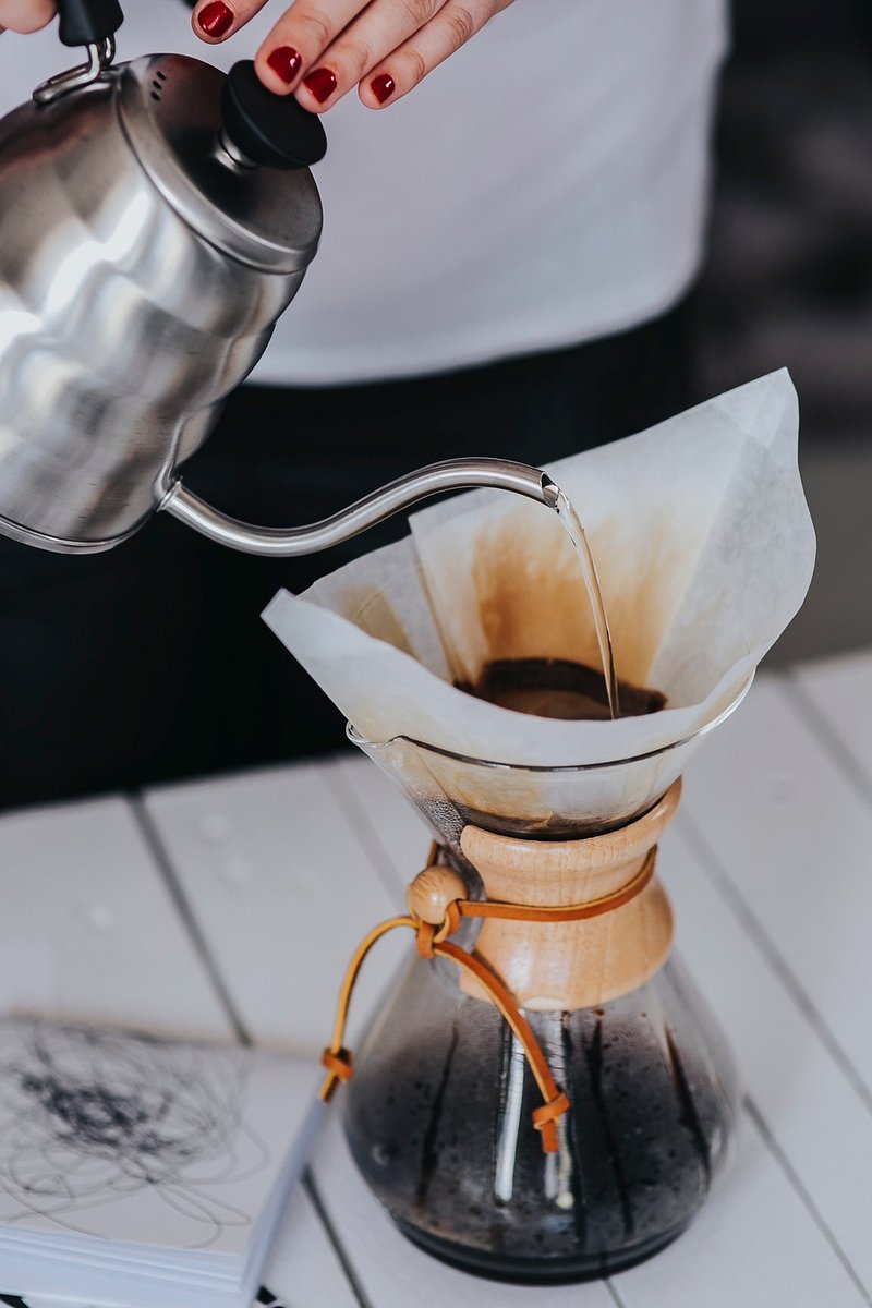 Hipster Barista Making Hand Drip Coffee Stock Photo - Download