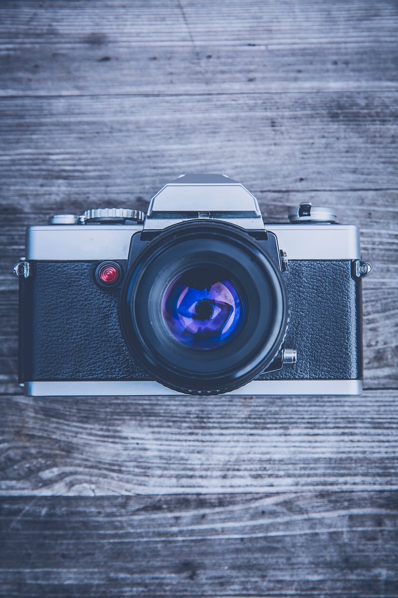 Vintage camera against blue backdrop - Premium Photo - rawpixel