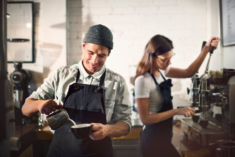 Barista working in a coffee Premium Photo rawpixel