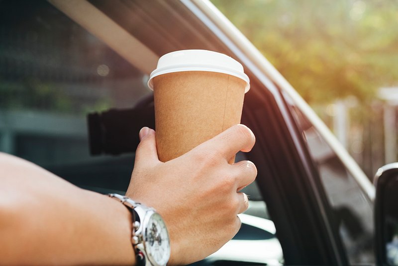 Takeaway coffee cup in a car, free image by rawpixel.com