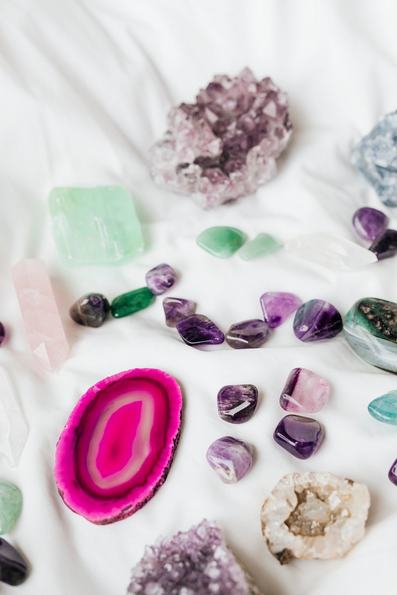 Colorful healing crystals on a blanket | Premium Photo - rawpixel