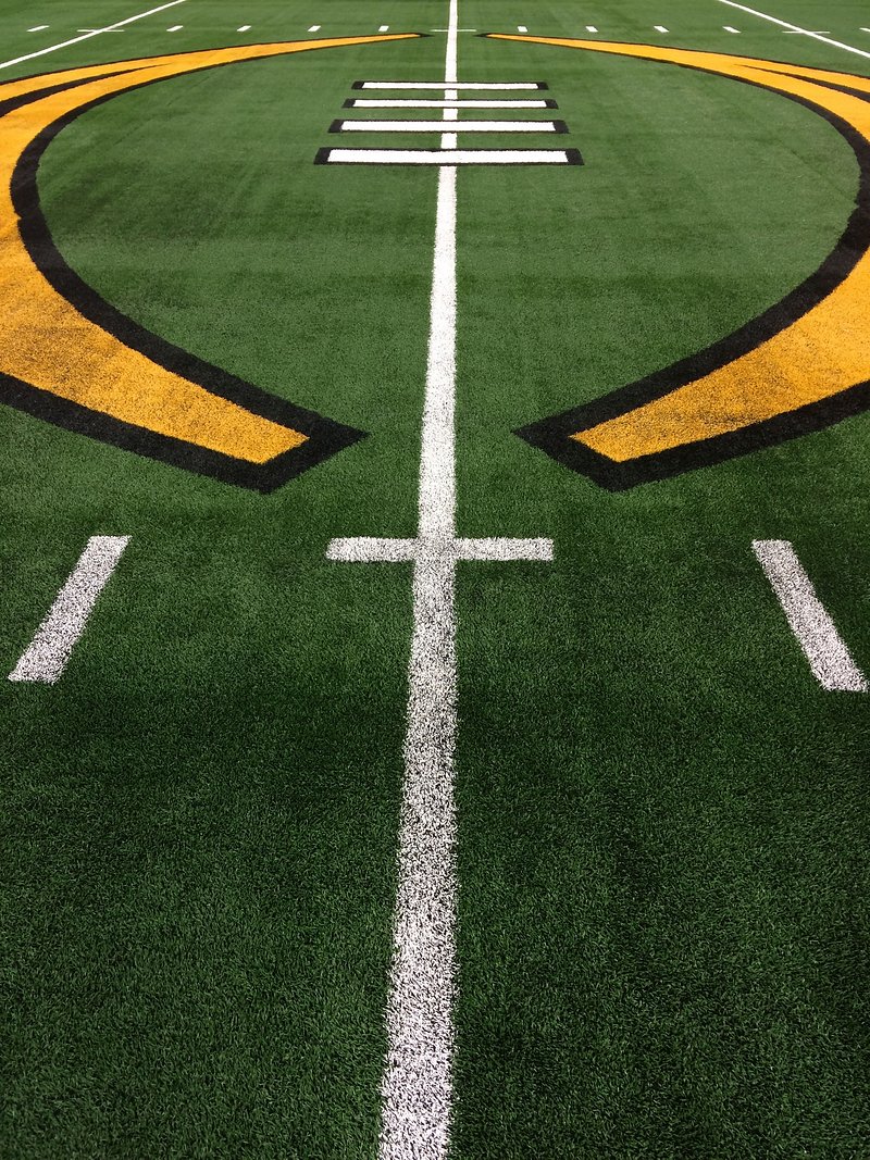 Premium Photo  Closeup american football team boys in sport stadium