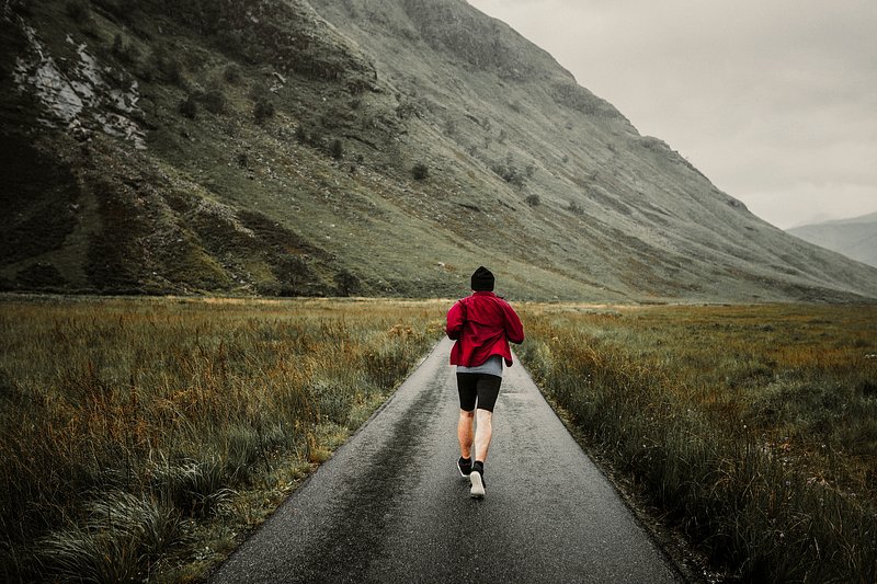 Runners path. Running in the countryside. Man Power walk. Power Walking. Run down.