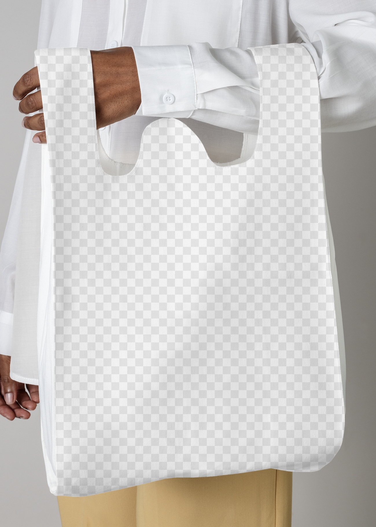 Download Black woman carrying a white reusable grocery bag mockup