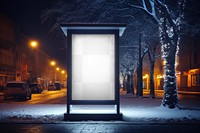 PNG Nighttime snowy street billboard mockup, transparent background