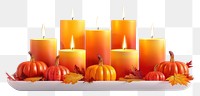 PNG Autumn candles with decorative pumpkins