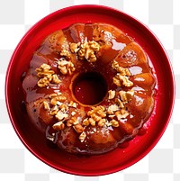 PNG A rich golden-brown rum cake with a glossy glaze and sprinkles of walnuts on top confectionery ketchup sweets.