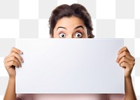 Women hiding behind a blank white board surprised adult photo. 