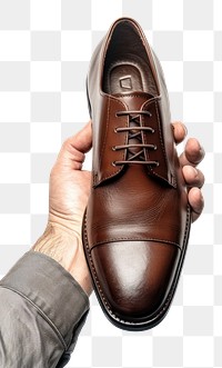 PNG Dark brown leather dress shoes footwear holding hand.