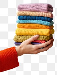PNG Stack of folding soft handmade colorful knitted holding variation dynamite.