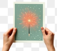 PNG  Fireworks floating holding hand art.