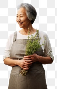 PNG  Woman holding Thyme herbs adult smile retirement.