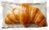 PNG Plastic wrapping over a croissaint croissant food 