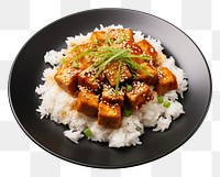 PNG  A rice and fried tofu with sesame seeds on the black plate food meal meat.