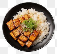 PNG  A rice and fried tofu with sesame seeds on the black plate food meat vegetable.