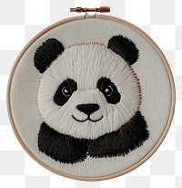 PNG A panda in embroidery style fabric white handcrafted.