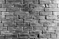 PNG Black and white brick wall background texture pattern.