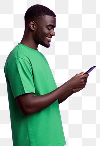 PNG An isolated black man wearing green shirt playing his phone with smile purple photography background.