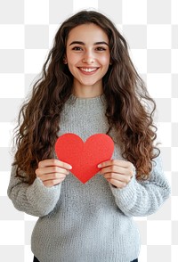 PNG Happy woman holding a heart paper shape sweater expression clothing.