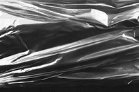 PNG Wrinkled plastic wrap texture background wrinkled black.