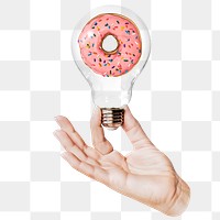 Donut png sticker, hand holding light bulb in dessert concept, transparent background