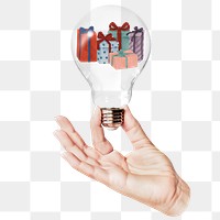 Gift boxes png sticker, hand holding light bulb in Christmas concept, transparent background