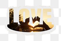 Love png word sticker, heart hands sunrise design on ripped paper, transparent background