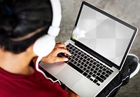 Laptop png mockup, man wearing headphones 