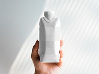 Paper bottle png mockup in woman's hand, transparent design