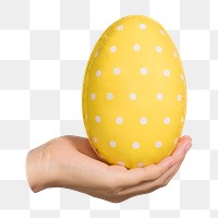 Png hand holding yellow egg sticker, transparent background