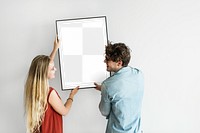 Picture frame png mockup, couple decorating wall, transparent design