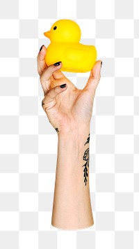 Png yellow duck rubber in hand on transparent background