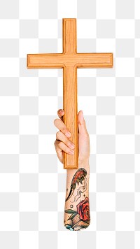 Wooden cross png in tattooed hand, transparent background