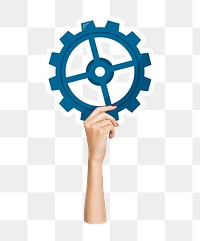 Hand holding png cogwheel sticker, transparent background