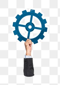 Hand holding png cogwheel sticker, transparent background