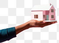 PNG Hand holding minimal house model finger confectionery architecture. AI generated Image by rawpixel.